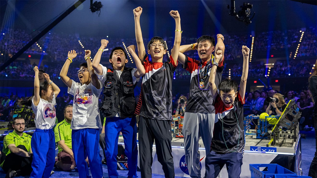 An alliance celebrates their win at the VEX Robotics World Championship.