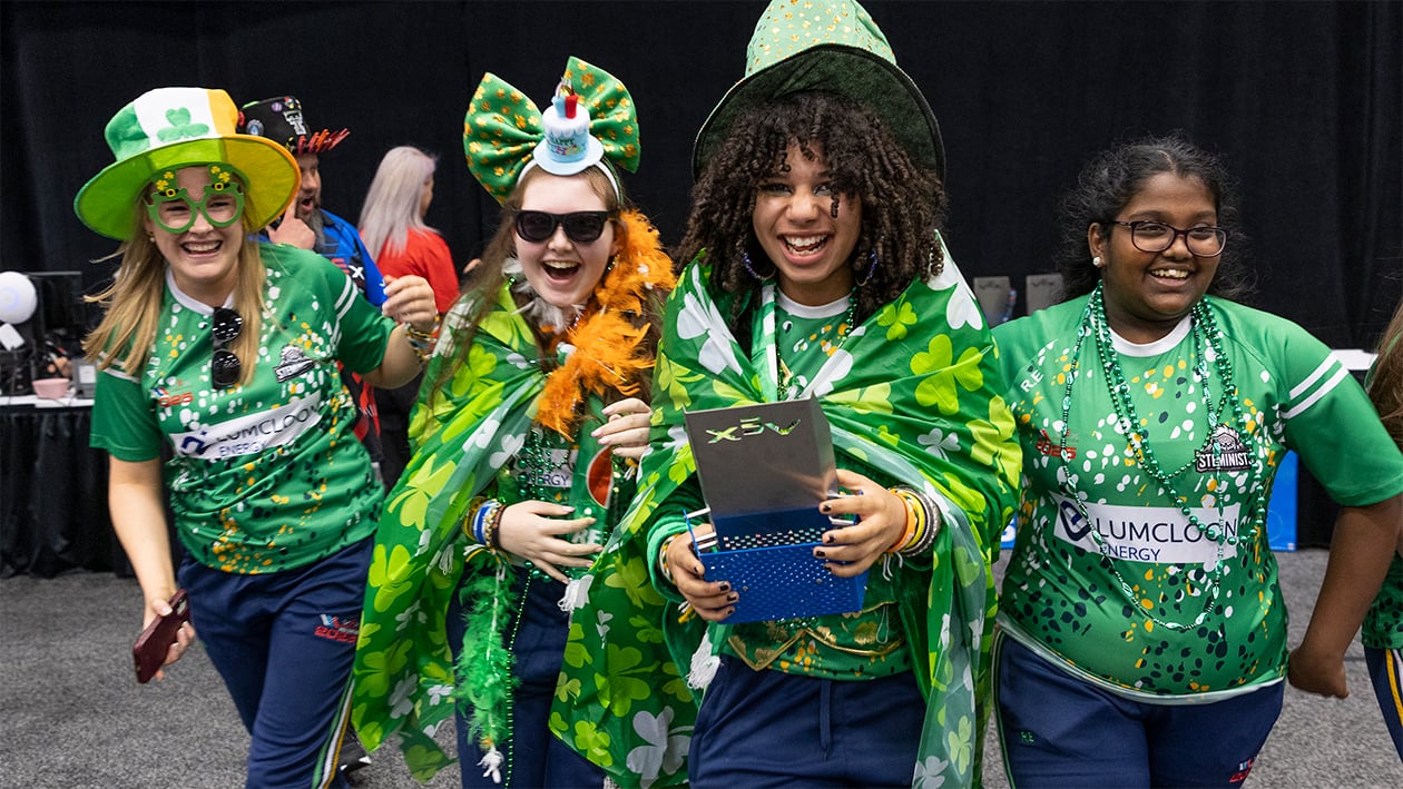 The SHS STEMinists smile after receiving an award at the VEX Robotics World Championship.