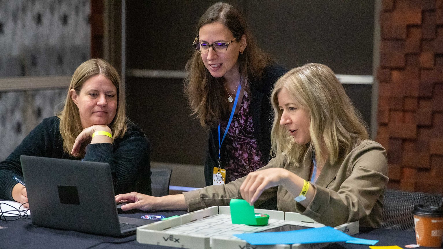 Dr. Maya Israel speaks with two educators at the 2025 VEX Robotics Educators Conference.