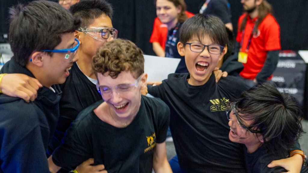 A group of students cheer at the VEX Robotics World Championship.