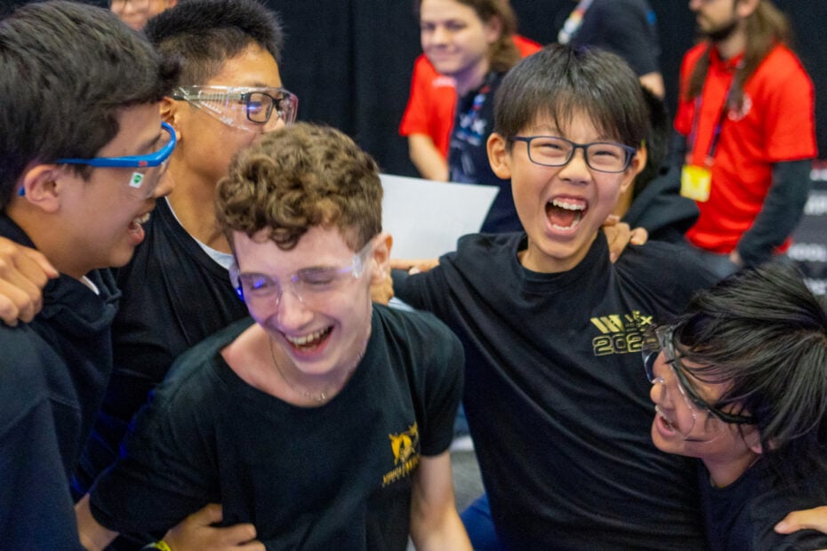 A group of students cheer at the VEX Robotics World Championship.